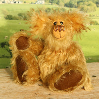 Cardhu sitting and waving, Cardhu is a one of a kind antique gold mohair artist bear with hand painted eyes and a sweet smile