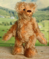 Chorley standing as if lookig into the distance. Chorley is a sweet and loving traditional one of a kind artist bear in beautiful grey flecked German mohair by Barbara Ann Bears, he stands 7.5 inches/19 cm tall