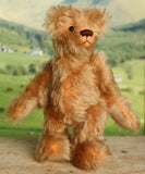 Chorley standing as if lookig into the distance. Chorley is a sweet and loving traditional one of a kind artist bear in beautiful grey flecked German mohair by Barbara Ann Bears, he stands 7.5 inches/19 cm tall