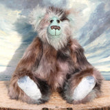 Clarence Cuddlemore a one of a kind teddy bear with light blue mohair and multi-coloured brown faux fur.