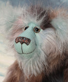 Close-up of Clarence Cuddlemore's face with light blue mohair and multi-coloured brown faux fur.