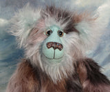 Close-up of Clarence Cuddlemore's face with light blue mohair and multi-coloured brown faux fur.