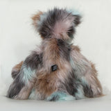 Clarence Cuddlemore artist teddy bear with light blue mohair and multi-coloured brown faux fur, viewed from beind