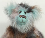 Close-up of Clarence Cuddlemore's face with light blue mohair and multi-coloured brown faux fur.