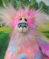 Cordelia's face showing her gorgeous colours, her beautiul eyes and nose, and her sweet smile.
Cordelia a sweet and colourful one of a kind artist bear in stunning multi-coloured faux fur and gorgeous long fluffy white mohair by Barbara-Ann Bears. Cordelia is 12 inches tall