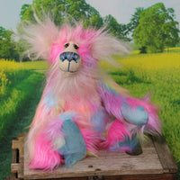 Cordelia sitting.
Cordelia a sweet and colourful one of a kind artist bear in stunning multi-coloured faux fur and gorgeous long fluffy white mohair by Barbara-Ann Bears. Cordelia is 12 inches tall