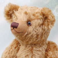 Close-up of a brown teddy bear with a blurred background
