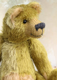 Dimpty Dimwit is sweet and happy bear, a veteran mohair artist bear from Barbara-Ann Bears, he stands 14 inches/36 cm tall. Dimpty Dimwit is made in khaki coloured straight mohair, with a beige mohair tummy and a proper belly button. He has pale beige wool felt paw pads, vintage boot button eyes and a charcoal wool nose