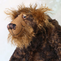 Douglas Trumbletown's face. showing his hand painted eyes, his beautifully embroidered nose and his sweet smile.
Douglas Trumbletown a sturdy and phlegmatic, one of a kind, mohair artist bear by Barbara-Ann Bears in wonderful brown and black tipped mohair, he stands 12.5 inches/31 cm tall