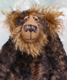 Douglas Trumbletown's face. showing his hand painted eyes, his beautifully embroidered nose and his sweet smile.
Douglas Trumbletown a sturdy and phlegmatic, one of a kind, mohair artist bear by Barbara-Ann Bears in wonderful brown and black tipped mohair, he stands 12.5 inches/31 cm tall