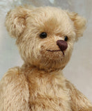 Douglas is a very sweet and friendly mohair artist teddy bear by Barbara Ann Bears, stands 11 inches/28 cm tall and is 8 inches/20 cm sitting. Douglas is a wonderful vintage traditional teddy bear we made in the early 1990s from antique gold German mohair, with felt paw pads and green glass eyes 