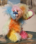 Ernie is a very happy and colourful little teddy bear, a one of a kind, mohair artist bear by Barbara-Ann Bears, he stands just under 6 inches/15 cm tall.  Ernie is made from many different colourful mohairs, hand painted eyes with hand coloured eyelids, a splendid nose embroidered from individual threads and he has a sweet, friendly smile. 