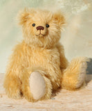 Euan, a mohair collector's teddy bear with a soft texture on a light background