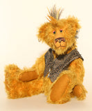 Ezra Plank, a punk Barbara Ann Bear in mustard gold with a mohawk, wearing a faux leather waistcoat
