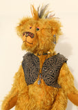 Ezra Plank, a punk Barbara Ann Bear in mustard gold with a mohawk, wearing a faux leather waistcoat