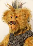 Ezra Plank, close-up of face, a punk Barbara Ann Bear in mustard gold with a mohawk, wearing a faux leather waistcoat