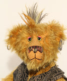 Ezra Plank, close-up of face, a punk Barbara Ann Bear in mustard gold with a mohawk, wearing a faux leather waistcoat
