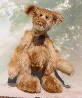 Fingal is quite a large and comical, one of a kind, artist bear by Barbara-Ann Bears in wonderful batik German mohair, he stands 20.5 inches/ 52cm tall and is 15 inches/38 cm sitting. Fingal is made from batik mohair in bands and patches of coffee and beige with greyish beige German wool felt paw pads, beautiful hand painted glass eyes with hand coloured eyelids, an impressive and wonderfully embroidered nose and an engaging smile. 