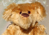 Groovy Greg is one wild cool guy, a veteran English mohair artist bear from Barbara-Ann Bears, he stands 17 inches/43 cm tall Groovy Greg was made in 1995 from beautiful antique gold English mohair with mid brown wool felt paw pads, dark amber glass eyes and a pert, chestnut coloured, meticulously embroidered nose. 