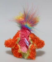 Harry Tickle is a very happy and colourful little one of a kind, hand dyed mohair and faux fur artist bear by Barbara-Ann Bears, he stands 6.5 inches/16 cm tall. Harry Tickle is made from hand dyed mohair, with long plumes of faux fur on his head, hand painted eyes, a multicoloured nose and a beaming smile a happy bear!