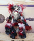 Hudson standing.
Hudson is a beautifully coloured and dignified one of a kind, artist teddy bear in gorgeous back, burgundy, white and beige faux fur and fluffy white mohair by Barbara-Ann Bears, he stands 15 inches/38 cm tall 