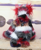 Hudson standing, showing his back and his stripy faux fur.
Hudson is a beautifully coloured and dignified one of a kind, artist teddy bear in gorgeous back, burgundy, white and beige faux fur and fluffy white mohair by Barbara-Ann Bears, he stands 15 inches/38 cm tall 