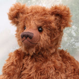Jasper is quite a large, elegant and charming, one of a kind, traditional artist teddy bear by Barbara Ann Bears in wonderful cinnamon mohair, he is 21 inches/53cm tall and is 15 inches/38 cm sitting. Jasper is made from a beautiful, cinnamon coloured mohair with pale beige German wool-felt paw pads and he has black glass eyes
