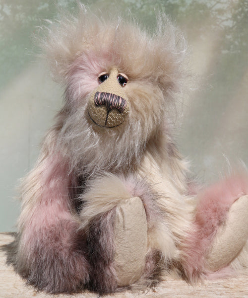 Jerry is a very sweet and gentle one of a kind, artist bear by Barbara-Ann Bears in gorgeous mohair and beautifully coloured pastel faux fur, he stands 14 inches/36 cm tall. He is made from a pale pink and cream faux fur with long cream mohair, cream wool felt paw pads, hand painted eyes, a beautifully embroidered nose and a cheerful smile.
