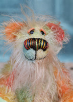 Keith is a very happy and colourful little one of a kind, hand dyed mohair artist bear by Barbara-Ann Bears, he stands 6 inches/15 cm tall.
Keith is made from hand dyed mohair, with hand dyed velvet paws, hand painted eyes and eyelids and a striking nose and sweet smile