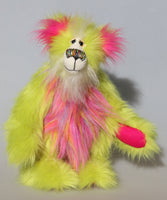 Leonardo is a flamboyant, fun-loving and comical, one of a kind, artist bear by Barbara-Ann Bears in luxurious mohair and rather wild lime faux fur, he stands 12 inches/30 cm tall Leonardo is made from lime faux fur, with a very long faux fur in pink, greyish blue and gold, a bright cerise faux fur and long and fluffy white mohair.His paws are cerise wool felt.  Leonardo has beautiful hand painted glass eyes with eyelids, a wonderfully embroidered nose and he has a huge beaming smile. 