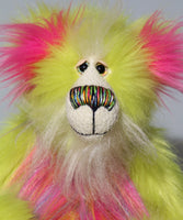 Leonardo is a flamboyant, fun-loving and comical, one of a kind, artist bear by Barbara-Ann Bears in luxurious mohair and rather wild lime faux fur, he stands 12 inches/30 cm tall Leonardo is made from lime faux fur, with a very long faux fur in pink, greyish blue and gold, a bright cerise faux fur and long and fluffy white mohair.His paws are cerise wool felt.  Leonardo has beautiful hand painted glass eyes with eyelids, a wonderfully embroidered nose and he has a huge beaming smile. 