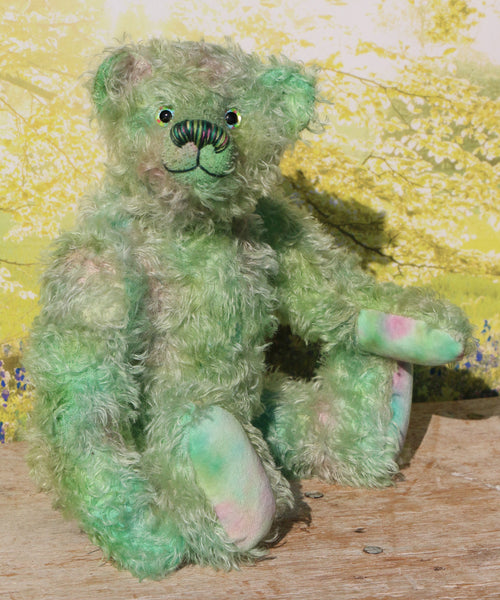 Logan sitting.
Logan is a very handsome traditional, one of a kind artist teddy bear in fabulous multi-shaded green hand dyed mohair by Barbara Ann Bears, he stands 14 inches/35cm tall 