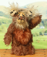 Nimble Nigel standing and waving. Nimble Nigel is an endearingly sweet and joyful one of a kind artist bear by Barbara-Ann Bears in wonderful brown mohair, he stands just 6.5 inches/17cm tall