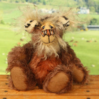 Nimble Nigel sitting. Nimble Nigel is an endearingly sweet and joyful one of a kind artist bear by Barbara-Ann Bears in wonderful brown mohair, he stands just 6.5 inches/17cm 