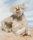 Otis is a sweet and very friendly, one of a kind, artist teddy bear in beautiful long pearl coloured mohair by Barbara-Ann Bears he stands 11 inches/28 cm tall .
Otis is made from a sumptuous, long, very dense, scruffily twirly, nearly white mohair and he has matching pale cream coloured German wool felt paw pads.