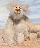 Otis is a sweet and very friendly, one of a kind, artist teddy bear in beautiful long pearl coloured mohair by Barbara-Ann Bears he stands 11 inches/28 cm tall .
Otis is made from a sumptuous, long, very dense, scruffily twirly, nearly white mohair and he has matching pale cream coloured German wool felt paw pads.