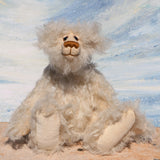 Otis is a sweet and very friendly, one of a kind, artist teddy bear in beautiful long pearl coloured mohair by Barbara-Ann Bears he stands 11 inches/28 cm tall .
Otis is made from a sumptuous, long, very dense, scruffily twirly, nearly white mohair and he has matching pale cream coloured German wool felt paw pads.