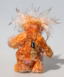Otis is a sweet and gently coloured one of a kind teddy bear in hand dyed mohair and faux fur by Barbara-Ann Bears, he stands 9.5 inches/24 cm tall.  He's made from beautifully coloured hand-dyed mohair and faux fur, with hand dyed velvet paw pads, beautiful hand painted glass eyes, a splendid nose and a beaming smile