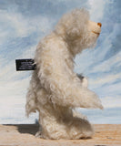 Otis is a sweet and very friendly, one of a kind, artist teddy bear in beautiful long pearl coloured mohair by Barbara-Ann Bears he stands 11 inches/28 cm tall .
Otis is made from a sumptuous, long, very dense, scruffily twirly, nearly white mohair and he has matching pale cream coloured German wool felt paw pads.