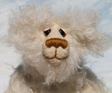 Otis is a sweet and very friendly, one of a kind, artist teddy bear in beautiful long pearl coloured mohair by Barbara-Ann Bears he stands 11 inches/28 cm tall .
Otis is made from a sumptuous, long, very dense, scruffily twirly, nearly white mohair and he has matching pale cream coloured German wool felt paw pads.