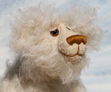 Otis is a sweet and very friendly, one of a kind, artist teddy bear in beautiful long pearl coloured mohair by Barbara-Ann Bears he stands 11 inches/28 cm tall .
Otis is made from a sumptuous, long, very dense, scruffily twirly, nearly white mohair and he has matching pale cream coloured German wool felt paw pads.