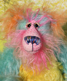 Percival Pringle is a sweet and happy, one of a kind artist bear by Barbara-Ann Bears in tropically colourful hand dyed mohair, he stands 9 inches/23 cm tall. Percival is made from a variety of mohairs, hand dyed in turquoise, pink, orange and yellow. He has hand dyed velvet paws, hand painted eyes, an intricately embroidered nose and a beaming smile. 