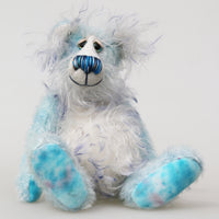 Perry is a gentle, happy teddy bear, a beautifully blue one of a kind, hand dyed mohair artist bear by Barbara-Ann Bears, he stands 9 inches/23 cm tall.   Perry is mainly made from a fairly short, sparse hand dyed sky blue, couple with a long fluffy white mohair with blue tipping and hand-dyed velvet paw pads. 