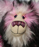 Petunia is a very large, cuddly and beautifully coloured, 26 inch tall one of a kind, artist bear by Barbara Ann Bears in luxurious fluffy faux fur and mohair.
Bluebell is made from the most gorgeous and luxurious faux fur and mohair, mainly a dense, long and fluffy faux fur in pink with black tipping. Her face, the fronts of her ears and the underside of her tail are a long, fluffy cream mohair. Bluebell has purple velvet paw pads that co-ordinate perfectly.