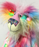 A close up of Plinkety Plonk by Barbara Ann Bears' face, showing his beautiful hand painted eyes, his multi-coloured nose and his beaming smile