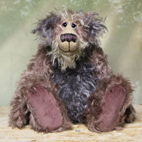 Priscilla Proon sitting. Priscilla Proon is a calm and thoughtful beautifully coloured one of a kind artist bear in gorgeous rose and grey hand dyed mohair by Barbara Ann Bears she stands 12 inches( 30cm) tall