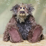 Priscilla Proon sitting. Priscilla Proon is a calm and thoughtful beautifully coloured one of a kind artist bear in gorgeous rose and grey hand dyed mohair by Barbara Ann Bears she stands 12 inches( 30cm) tall