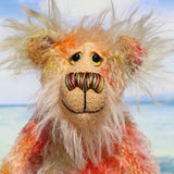 Rowan is a very happy and sweet teddy bear, a colourful, one of a kind, artist bear by Barbara-Ann Bears in beautiful hand-dyed mohair

Rowan stands 10 inches/25 cm tall