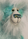 He is made from mohair hand dyed in shades of blue, green, turquoise and lime, His face, the fronts of his ears and the underside of his tail are made from a long, fluffy white faux fur and he has hand dyed velvet paws Sebastian Swoon has beautiful, hand painted eyes with hand coloured eyelids, a splendid nose embroidered from individual threads to complement his colouring and he has a sweet, friendly smile