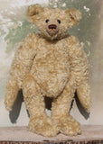 Sir Galahad is a very large, elegant and huggable, one of a kind, classical mohair artist teddy bear made by Barbara-Ann Bears Sir Galahad stands 24.5 inches/62 cm tall and is made from dense and wavy, golden German mohair with beige wool felt paw pads, large black boot button eyes, an impressive brown nose and the sweetest smile. 